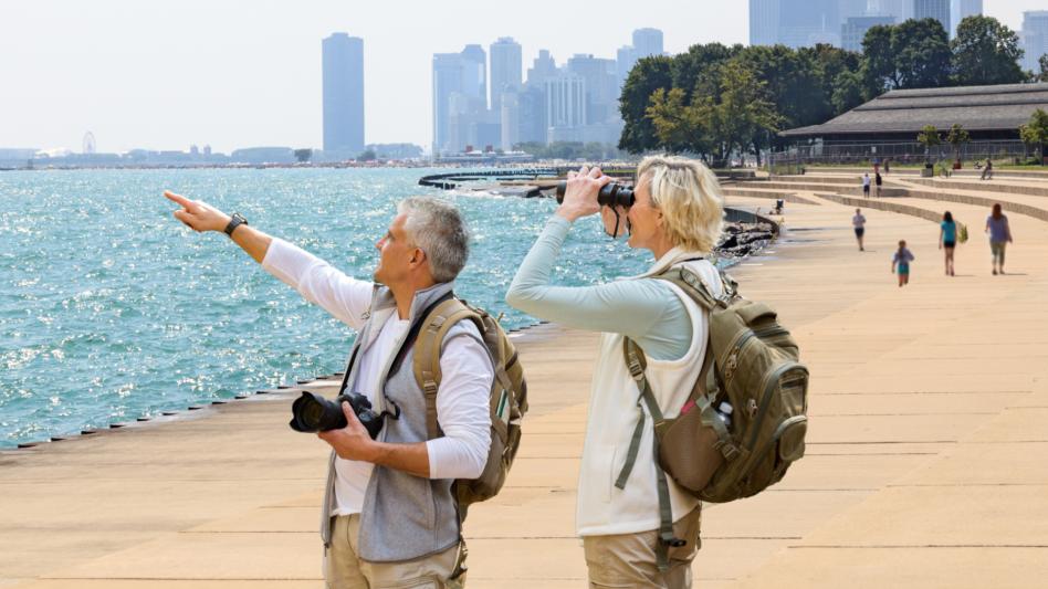 Couple pointing at Lake Michigan